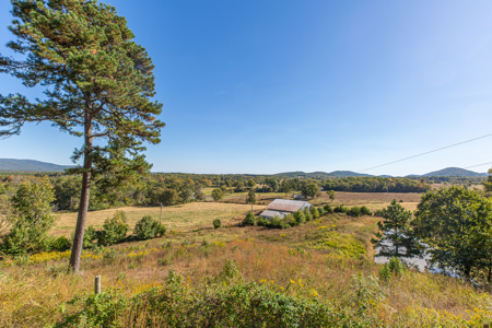 34 Acres with Stunning Mountain Views – Income-Producing Home - image 31