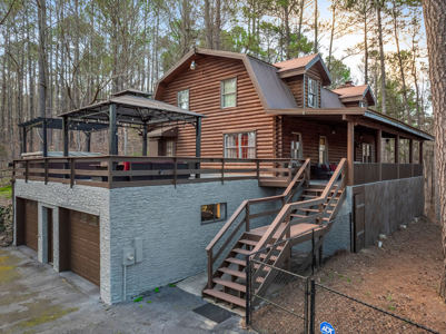 Red Cedar Log Home for Sale in Hayden, AL – 8.5± Acres with Pond - image 1