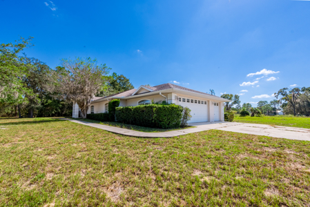 Home with a backyard golf course view - image 47