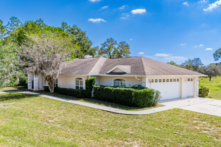 Home with a backyard golf course view - image 46