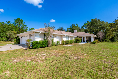 Home with a backyard golf course view - image 43