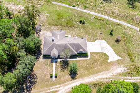 Home with a backyard golf course view - image 39