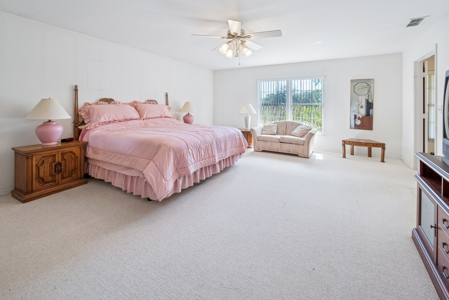 Home with a backyard golf course view - image 11