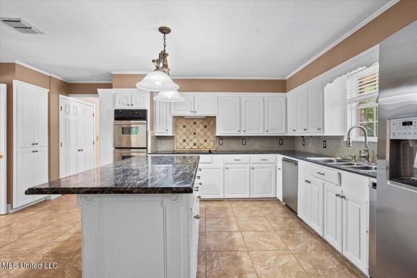 Executive Brick Home with Pool and Lake in McComb MS