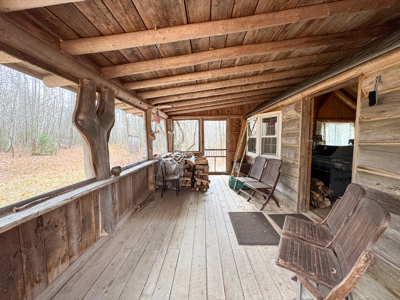 Peaceful Log Cabin Retreat with 128.8 Acres - image 6