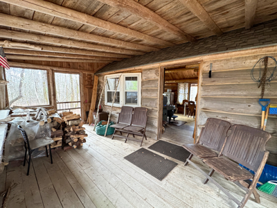 Peaceful Log Cabin Retreat with 128.8 Acres - image 7