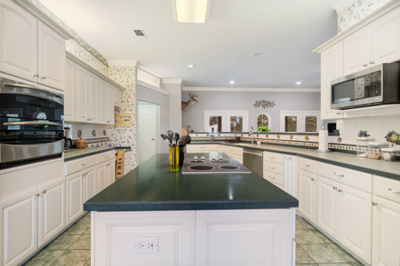 Self-Sufficient Haven with Shops, Greenhouse & Storm Bunker - image 23