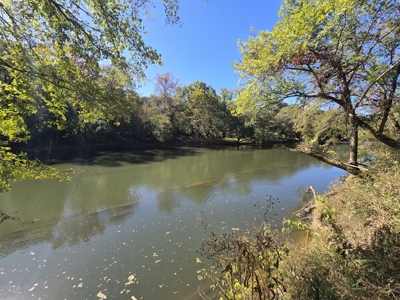 Land with Frontage to Blackfork River and National Forest - image 3