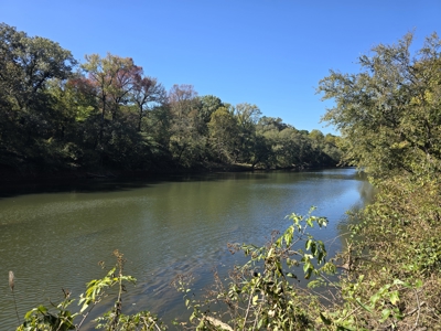 Land with Frontage to Blackfork River and National Forest - image 1