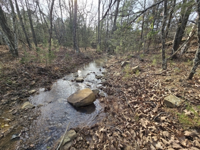 13.6 Acre Off-Grid Property – Creek Frontage - Owner Finance - image 1