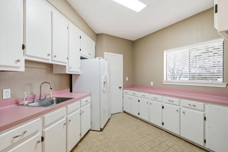 East Texas Homestead 3/3/2 Brick + Large Shop & 6.47 Wooded Acres - image 26