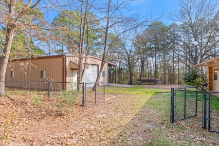 East Texas Homestead 3/3/2 Brick + Large Shop & 6.47 Wooded Acres - image 39