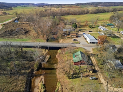 Welcome to a place with comfort, charm, and riverfront living - image 42