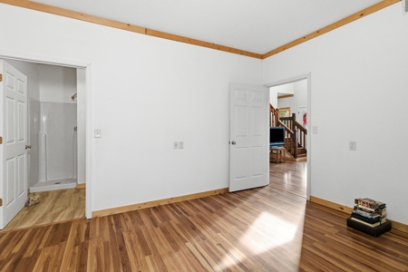 Welcome to a place with comfort, charm, and riverfront living - image 14