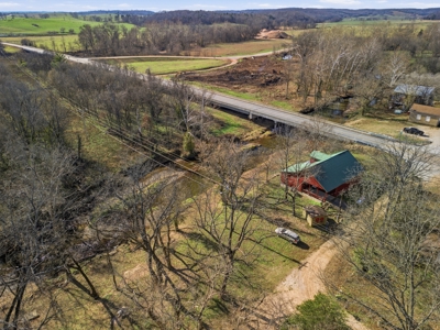 Welcome to a place with comfort, charm, and riverfront living - image 37