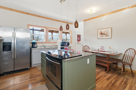 Welcome to a place with comfort, charm, and riverfront living - image 5