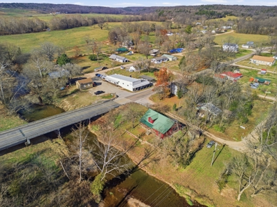 Welcome to a place with comfort, charm, and riverfront living - image 43