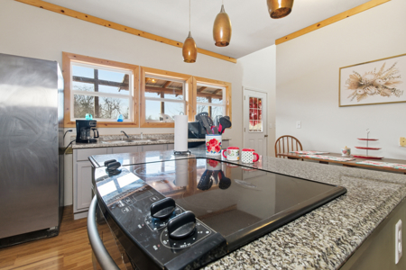 Welcome to a place with comfort, charm, and riverfront living - image 7