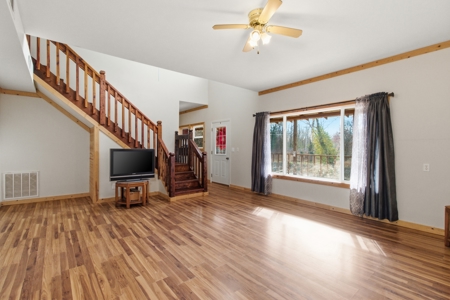 Welcome to a place with comfort, charm, and riverfront living - image 4