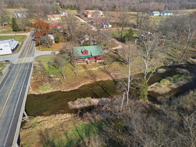 Welcome to a place with comfort, charm, and riverfront living - image 39