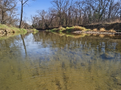 Welcome to a place with comfort, charm, and riverfront living - image 36