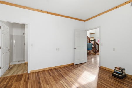 Welcome to a place with comfort, charm, and riverfront living - image 13