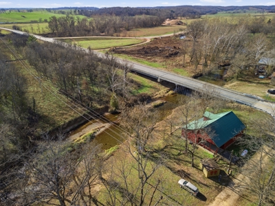 Welcome to a place with comfort, charm, and riverfront living - image 38