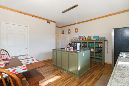 Welcome to a place with comfort, charm, and riverfront living - image 8