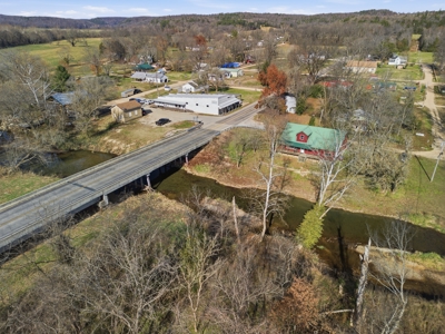 Welcome to a place with comfort, charm, and riverfront living - image 24