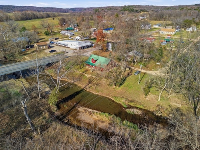 Welcome to a place with comfort, charm, and riverfront living - image 40