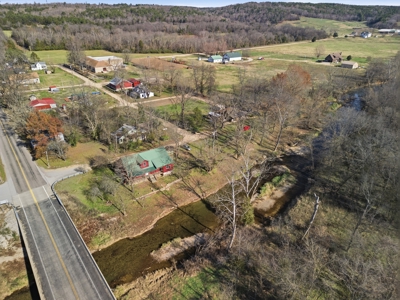 Welcome to a place with comfort, charm, and riverfront living - image 46