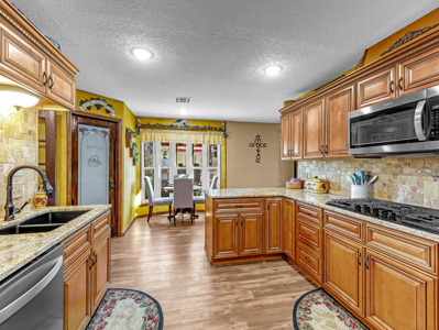 Home in ABM – Poteau, OK | 3 Bed • 2.5 Bath • Pool • Shop - image 23