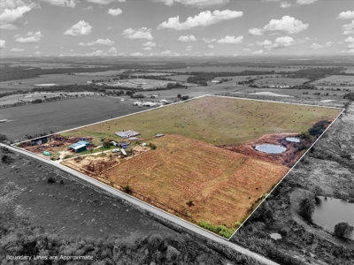 Turnkey Ag Property with Barns, Utilities & Ponds on 40+ Acres - image 1