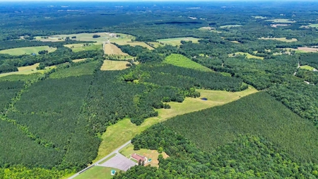 108-Acre Homestead & Timber Tract | Private Pond & Hay Fields - image 3