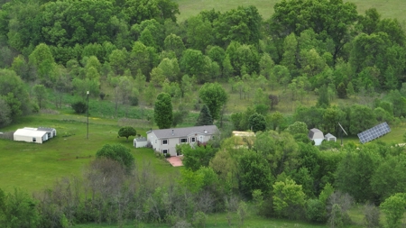 Off-Grid Solar Renewable Energy System Home on 67 Acres with Pine - image 4