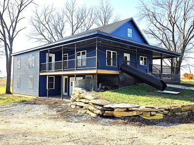 Polk County MO Farm For Sale Beautiful Home & Large Green Houses - image 2