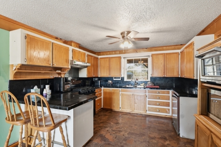 45 Fenced Acres + 4/3 Home + 1,400 Sq Ft Climate-Controlled Shop - image 33