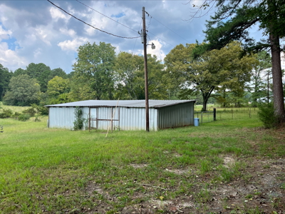 East Texas Land for Sale - Secluded Acreage with Pond, Utilities - image 11