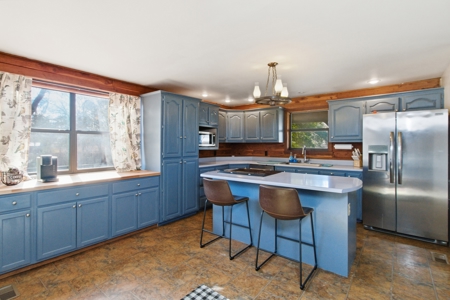 Riverfront Log Home on 5 Acres with Income Potential - image 10