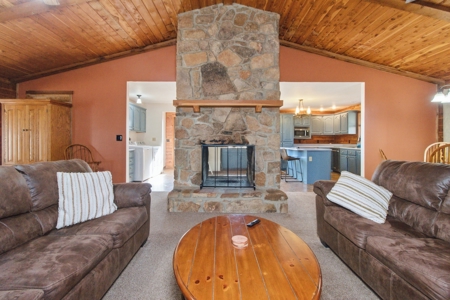 Riverfront Log Home on 5 Acres with Income Potential - image 9