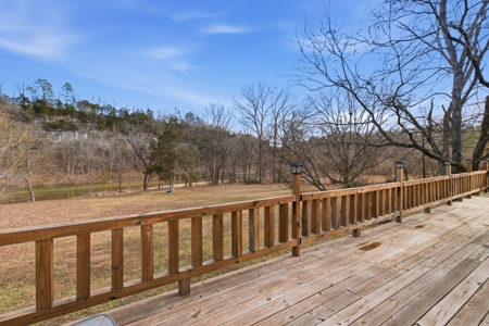 Riverfront Log Home on 5 Acres with Income Potential - image 4