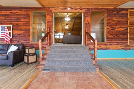 Riverfront Log Home on 5 Acres with Income Potential - image 18