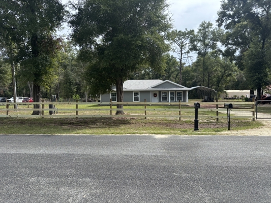 1 Acre. 3 Bedrooms. Paved Road. Perfect Location.