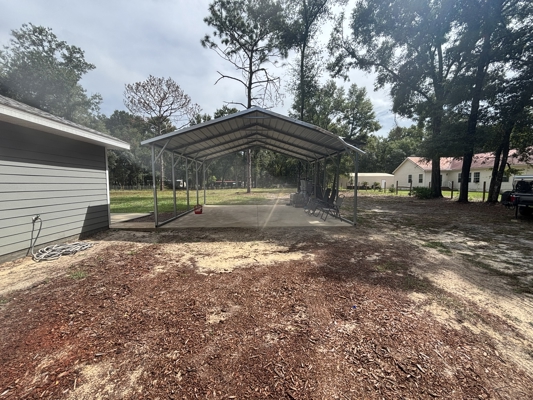 1 Acre. 3 Bedrooms. Paved Road. Perfect Location.