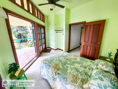 Titled Waterfront Home with Elevated Sea Views and Breezes - image 24