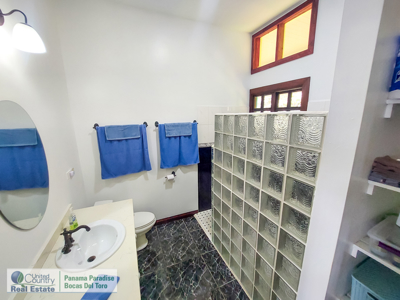 Titled Waterfront Home with Elevated Sea Views and Breezes - image 16