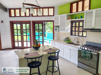 Titled Waterfront Home with Elevated Sea Views and Breezes - image 4