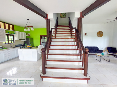 Titled Waterfront Home with Elevated Sea Views and Breezes - image 13