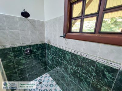 Titled Waterfront Home with Elevated Sea Views and Breezes - image 27