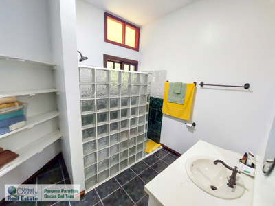 Titled Waterfront Home with Elevated Sea Views and Breezes - image 26